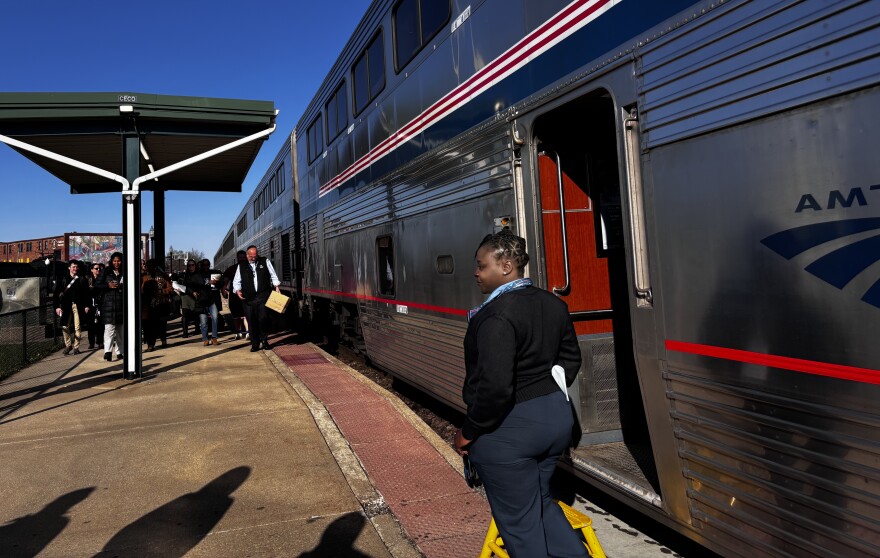 Amtrak employees and travelers step off the California Zephyr in Galesburg on Tuesday, March 19, 2024. The Chicago to California route is celebrating the 75th anniversary of its inaugural run on March 20, 1949.