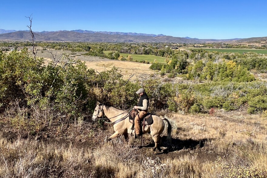 A rider travels along trails above Pinion Lane in Oakley.