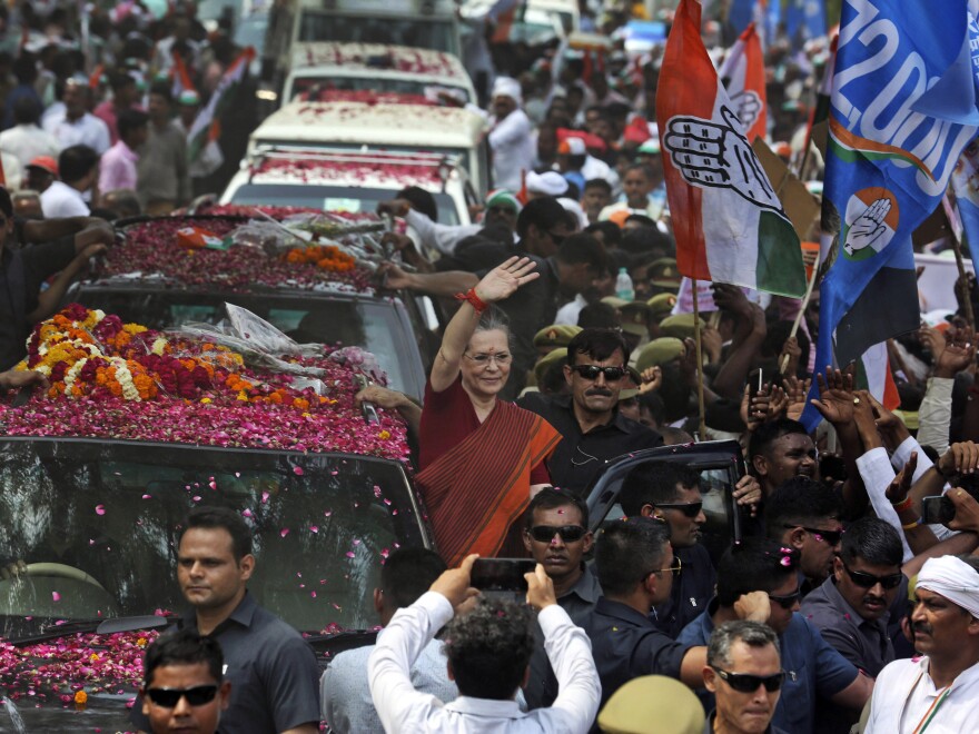 India's opposition Congress party leader Sonia Gandhi (center) waves as she arrives to file her nomination papers for elections, in Rae Bareli, Uttar Pradesh, India, on Thursday. The Congress party dominated Indian politics for much of the country's history but has been overshadowed in recent years by the Hindu nationalist BJP.