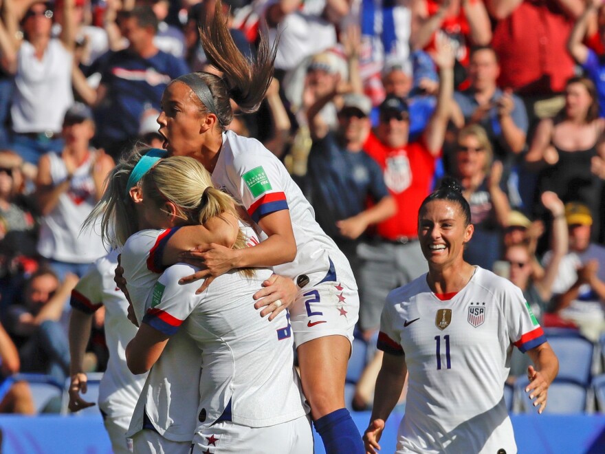 U.S. players celebrate after teammate Julie Ertz scored their side's second goal during the Women's World Cup Group F soccer match between United States and Chile at Parc des Princes in Paris, France on Sunday. [Alessandra Tarantino / AP]