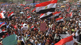 Thousands of Egyptians rally in Cairo's Tahrir Square on April 20, 2012 to protest against the ruling military and hold-overs from the former ruling government ahead of the presidential election to be held at the end of May.
