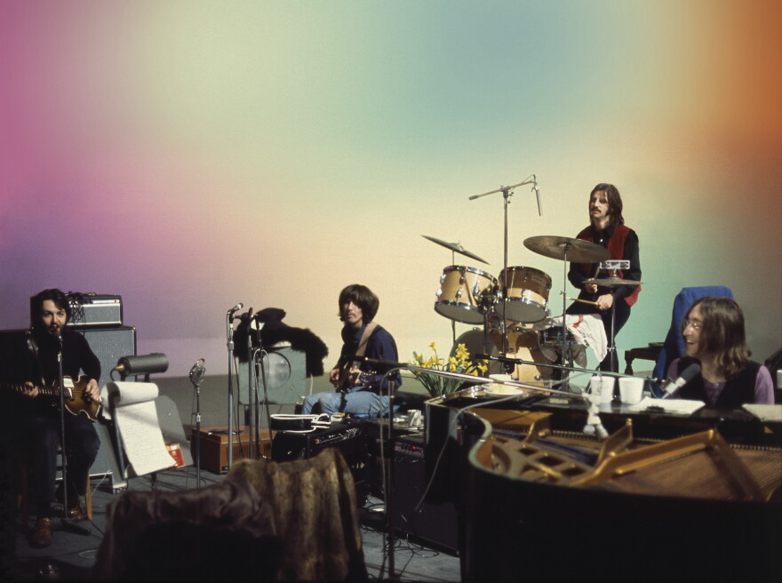 From left, Paul McCartney, George Harrison, Ringo Starr and John Lennon work through a song for their album "Let It Be." 