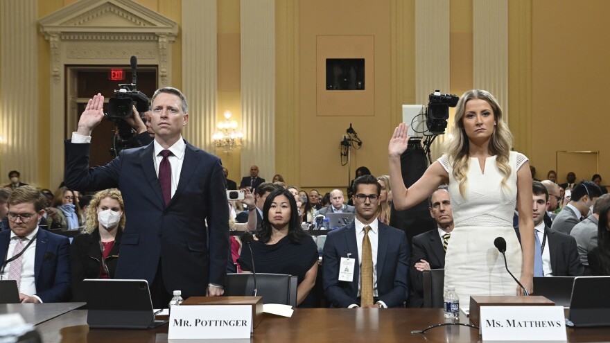 Matt Pottinger, former deputy national security adviser, and Sarah Matthews, former White House deputy press secretary, are sworn in as the House select committee investigating the Jan. 6 attack on the U.S. Capitol holds a hearing on Thursday.