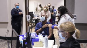 Hoosier health care workers receive the COVID-19 vaccine.