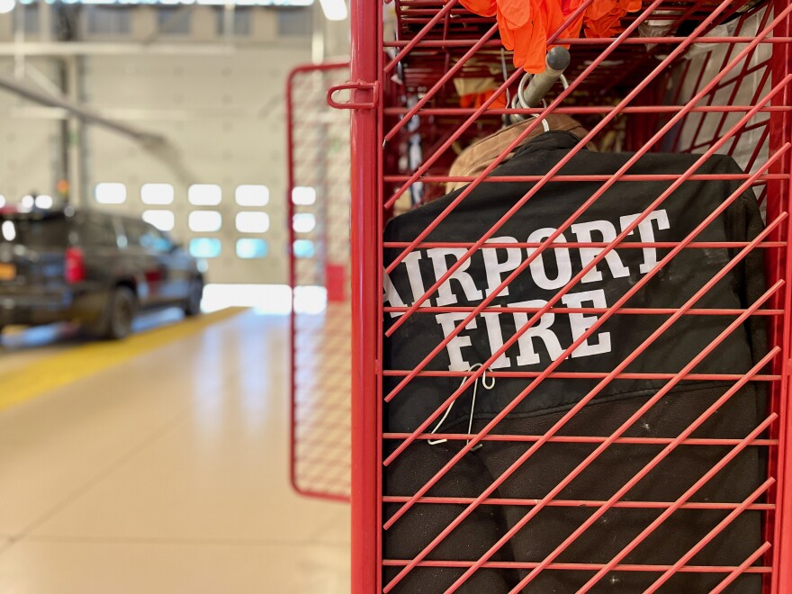 A firefighter's jacket can be seen inside a locker at the Buffalo-Niagara International Airport's Fire Department.