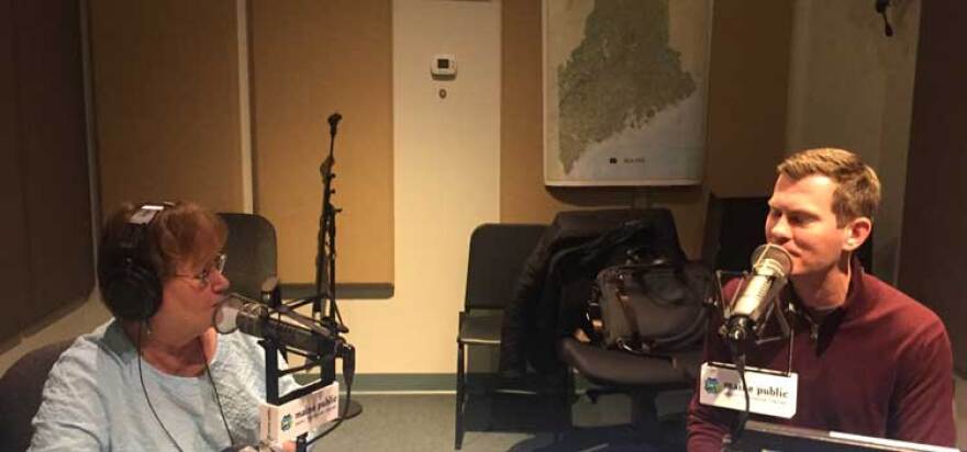 Robin Rilette (l.) with Portland Municipal Organist James Kennerley (r.) discussing the upcoming Friends of the Kotzschmar Organ Halloween Silent Film event.