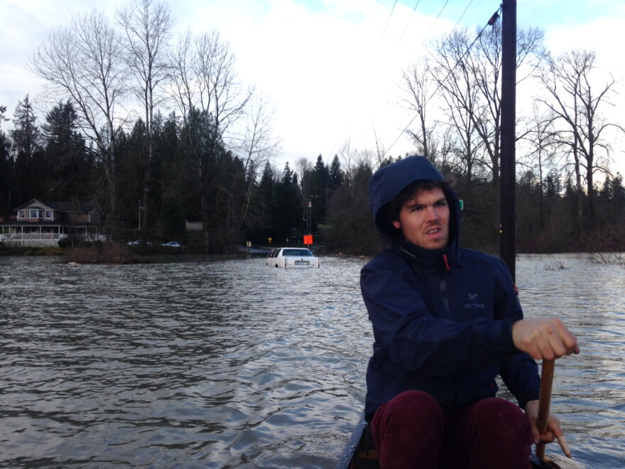 Andrew Ide grapples with flooding on his farm in Snohomish.