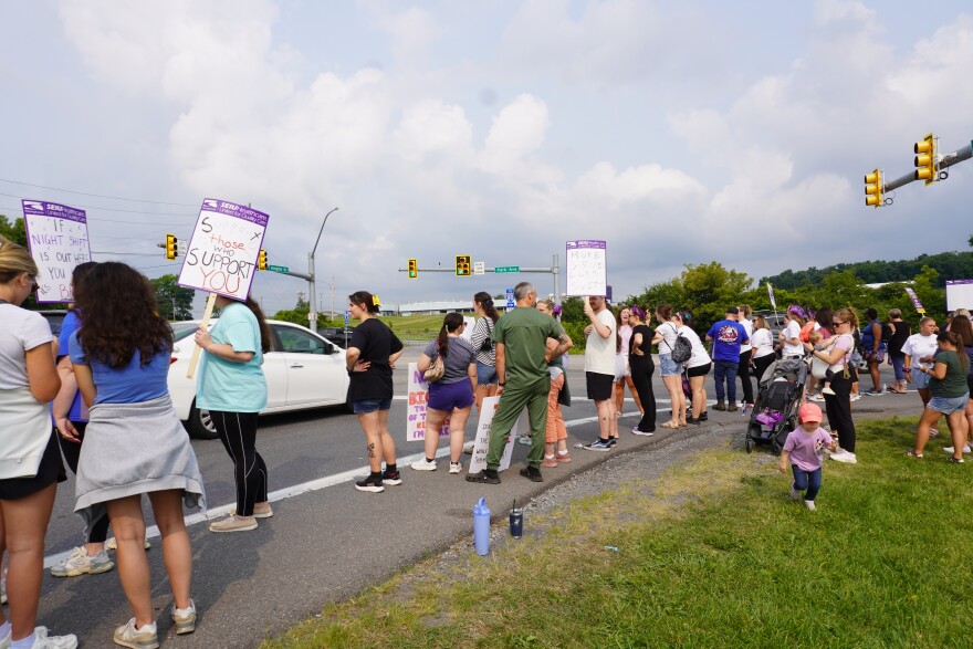 The picket line extends from the shoulders of Hospital Drive to Park Avenue. Traffic can still come in and out of the hospital. 