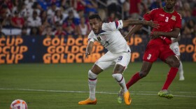 Forward Jesús Ferreira, left, fights for the ball with St. Kitts and Nevis defender Gerard Williams on Wednesday, June 28, 2023 at CityPark in St. Louis. Ferreira ended the night with three goals. 
