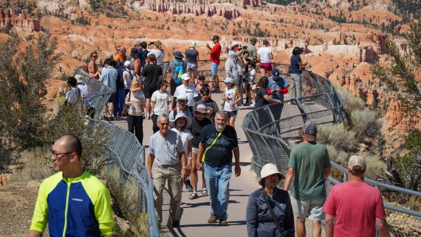 Visitors crowd a viewpoint at Bryce Canyon National Park in southern Utah, Aug. 19, 2025.