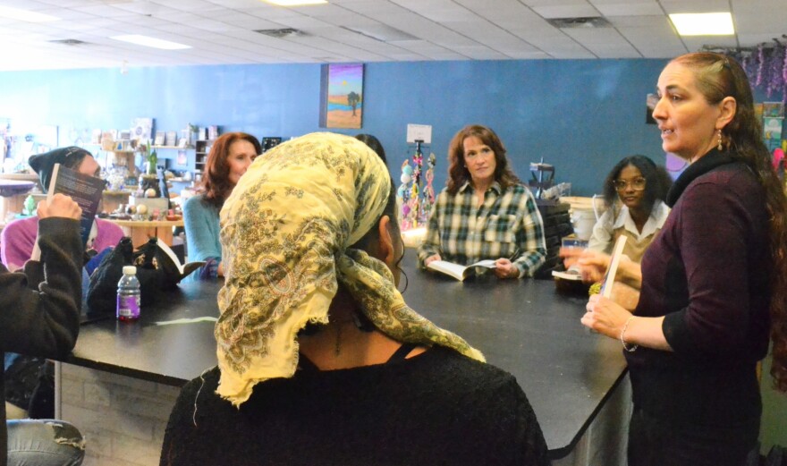 Fearnow, (far right) leading a workshop on the step-by-step process she has developed to heal the things that bother you.