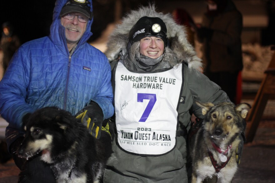 Amanda Otto celebrates her second-place finish with Jeff King and dogs Patience and Butch