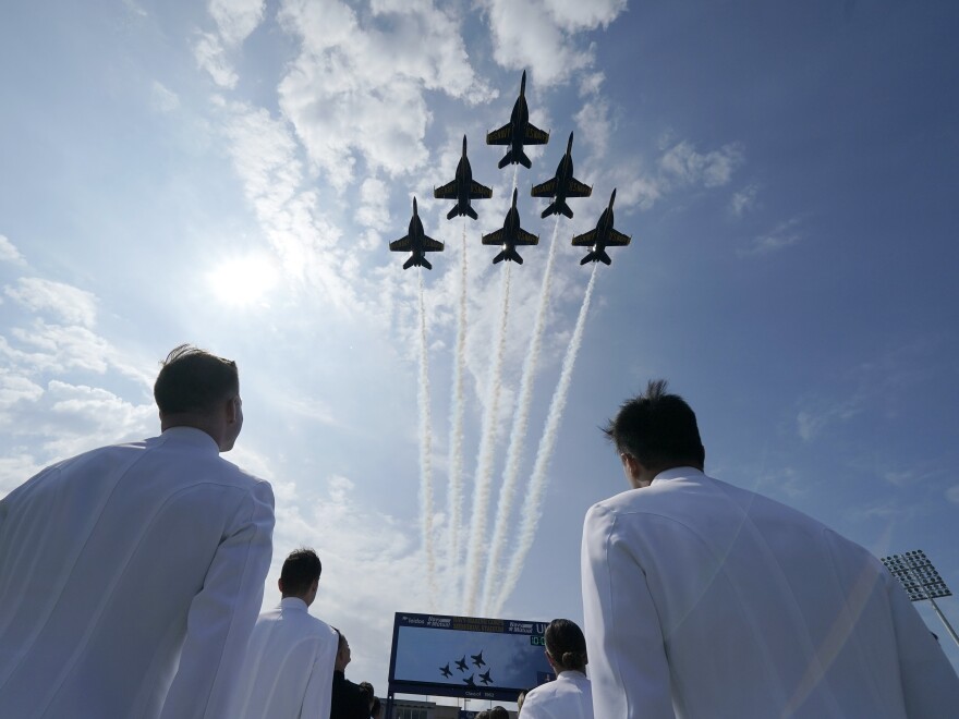 The Blue Angels fly over the graduation and commissioning ceremony at the U.S. Naval Academy in Annapolis, Md.
