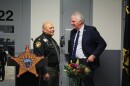 Cuyahoga County Sheriff Harold Pretel (left) speaks to County Executive Chris Ronayne (right) at a program commemorating the opening of a veterans' pod at the jail in Downtown Cleveland.