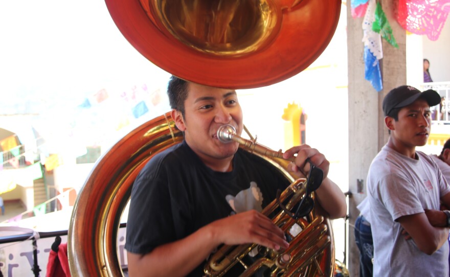 Julian Gonzalez playing his tuba in Santa Maria Tavehua.