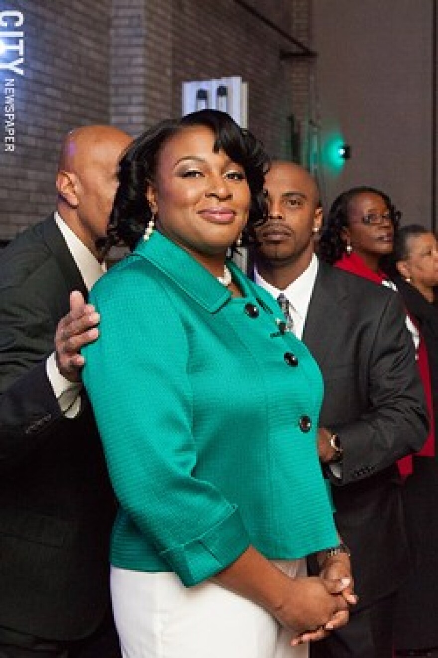 Mayor Warren and her husband Timothy Granison, right, before her inauguration ceremony in 2014.