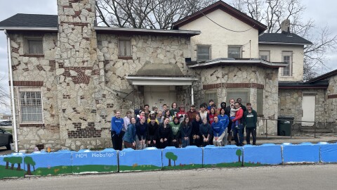 University of Dayton River Stewards painted a mural outside of a food pantry in Old North Dayton. The neighborhood has used the Dayton Home Repair Network to apply for funding to turn the pantry into a “community resilience hub.”