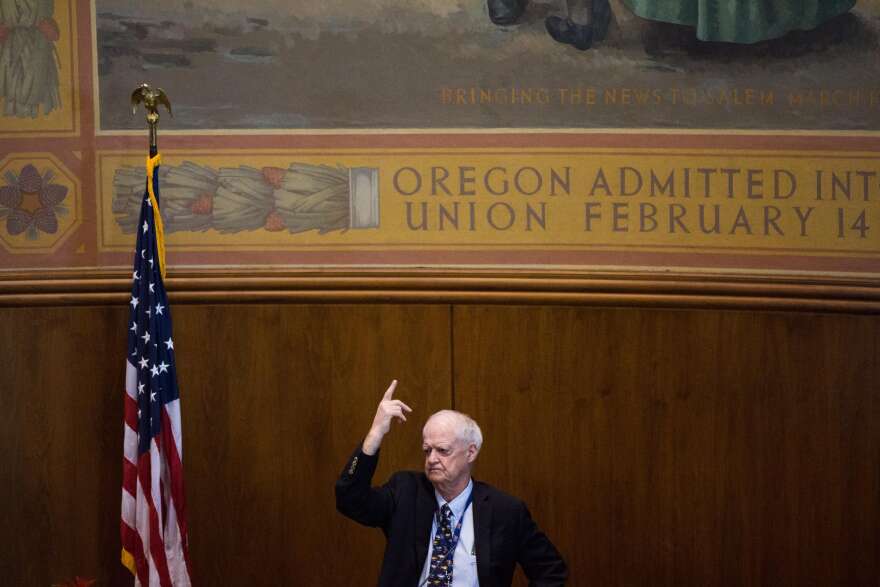 Senate President Peter Courtney, D-Salem, signals a vote on Saturday, June 29, 2019. Courtney says the Legislature is considering filing suit against Gov. Kate Brown to challenge recent vetoes.