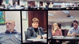 Eaton Rapids Police Chief Larry Weeks, lower far left, listens to others during the city council's Monday work session. Mayor Pamela Colestock is pictured in the lower middle frame.
