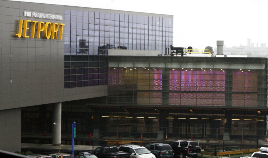 In this Sept. 7, 2011 photo, work was near completion of a colorful, $75 million passenger terminal at the Portland International Jetport in Portland, Maine. 