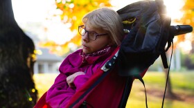 Becca Ewing-Ford sits in her jogger Wednesday Oct. 19 at East City Park in Moscow. Photo by Rachel Sun