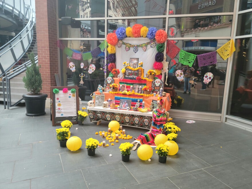 An ofrenda at Saturday's Dia de los Muertos celebration on Fourth Street Live.