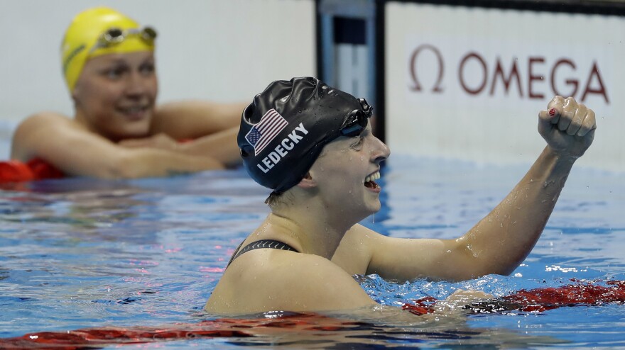 Katie Ledecky celebrates after winning the gold Tuesday night in the 200-meter freestyle over Sweden's Sarah Sjostrom (left). Ledecky won the 400-meter freestyle previously and will be heavily favored in the 800-meter freestyle.