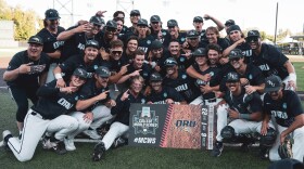 The Oral Roberts Golden Eagles celebrate their advancement to the College World Series.