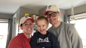 Amy Antioho stands with her son Mark and husband Peter in early 2020.