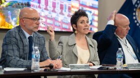 St. Louis Mayor Cara Spencer, center, objects to police leaders not including their health insurance benefits into their total compensation presented for justification to induce wide-sweeping commander raises during a meeting of the St. Louis Board of Police Commissioners at the department’s headquarters on Wednesday, June 17, 2026, in Downtown West.