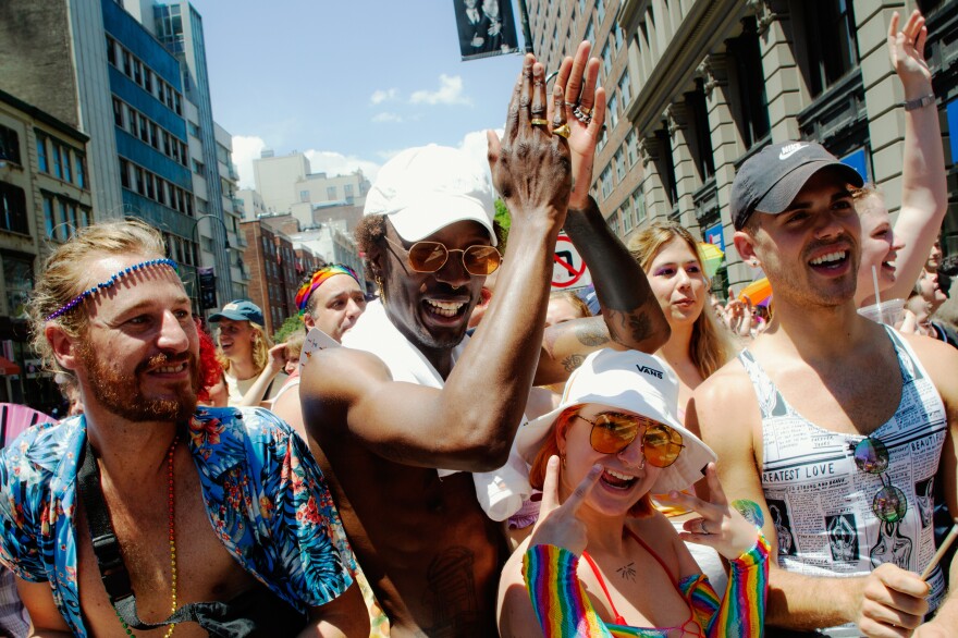 Paradegoers celebrate at the New York City Pride parade on Sunday.