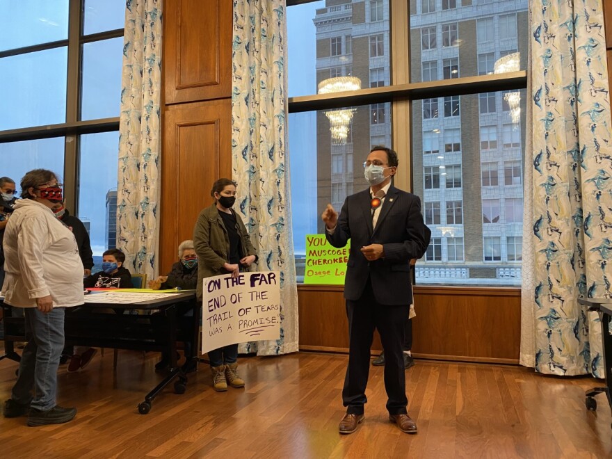 Cherokee Nation Principal Chief Chuck Hoskin Jr. speaks at a rally before Native Americans and allies marched to an Indian affairs commission special meeting about the city's brief calling for the reversal of McGirt v. Oklahoma.