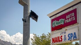 An automatic license plate reader camera on a traffic light pole in Salt Lake County, July 30, 2026.