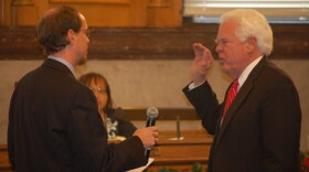 Democratic Council Member David Mann is sworn in at City Hall in 2013 for a four-year term, a limit that could change come November.