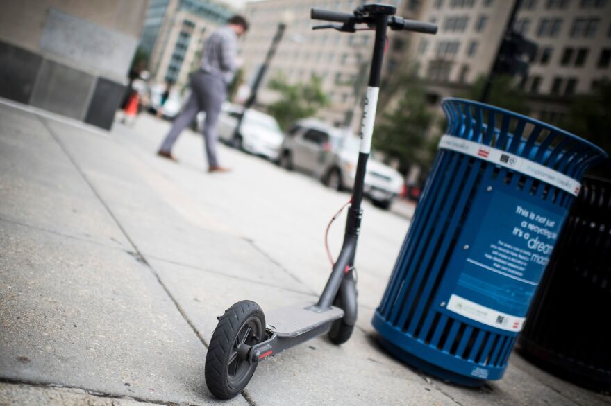 A Bird electric scooter found parked on a sidewalk in Washington, D.C. Pedestrian advocates are concerned about scooters blocking sidewalks.