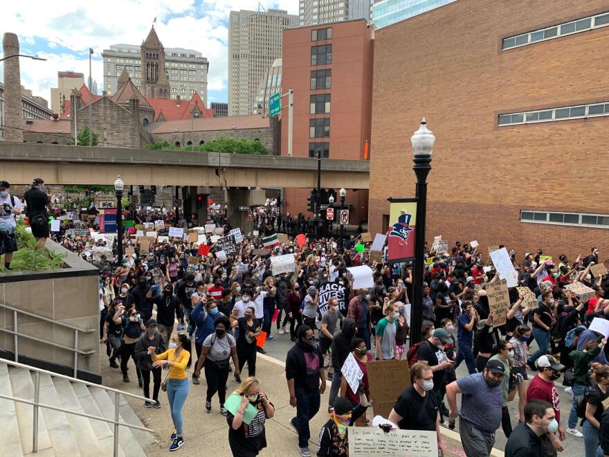 Demonstrators march past Duquesne University on May 30, 2020.