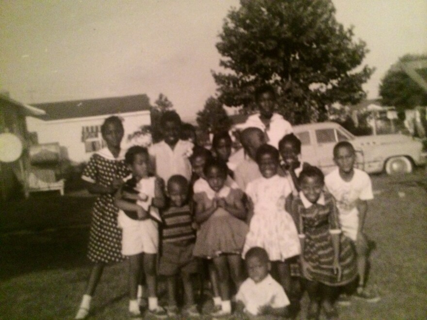 Children in the Truxton neighborhood of Portsmouth, Va., where professor Brenda Stevenson grew up, pose for a photo.
