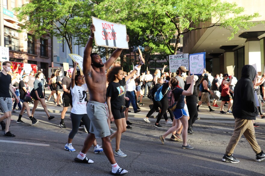 Protesters march down High Street in Columbus on June 2, 2020.