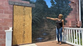 Tubman Museum Executive Director Linda Harris Points to Door of Break-In