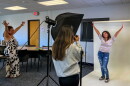 Rebeca Carrasquillo (left) is helping her mentee Esmeraida Figueroa (right) with her poses for a photoshoot with Big Brothers Big Sisters of Connecticut on September 19, 2026. The pair were photographed for a feature in the organization's 2026 Annual Report.