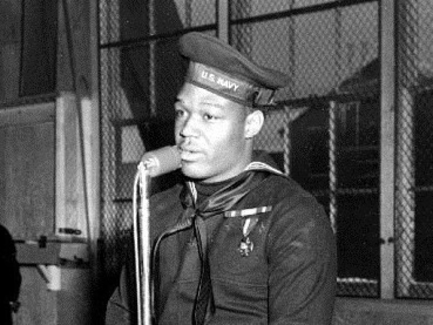 U.S. Navy Mess Attendant First Class Doris Miller speaking during his war bond tour stop at the Naval Training Station, Great Lakes, Ill. on Jan. 7, 1943.