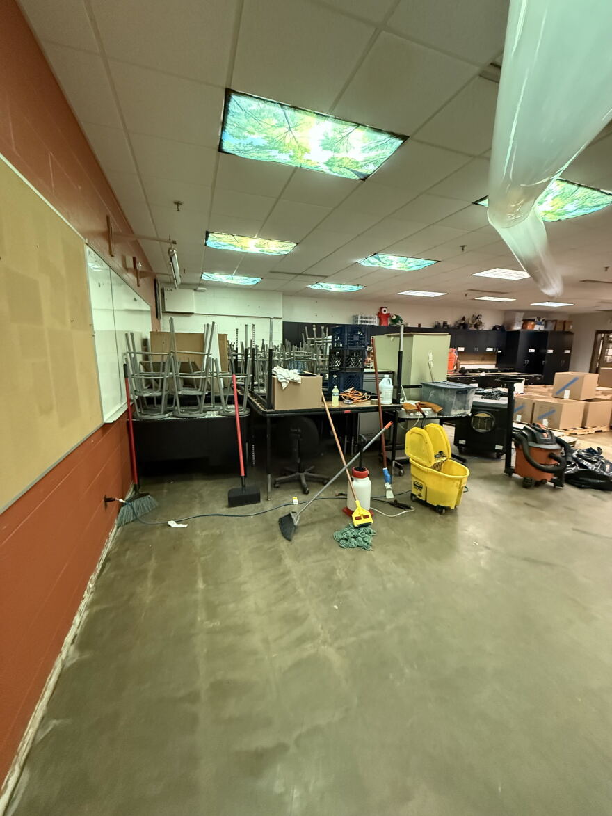 Paige Bauske's art classroom at Riverside University High School after flooding in August 2025. The floors and bottom cabinets needed to be replaced, and many of her art materials were destroyed.