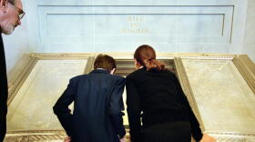 Dennis A. Daellenbach, the Director of the Gerald R. Ford Presidential Library And Museum, left, looking over their shoulders, Adam Jennison, 13, of NW DC, middle, and Madeleine Joseph, 13, of Northwest Washington, take their first peek at the actual Bill of Rights document, Wednesday, September 17, 2003. President George W. Bush joined others to celebrate the re-opening of the National Archives Rotunda after a two-year renovation, in Washington, DC.