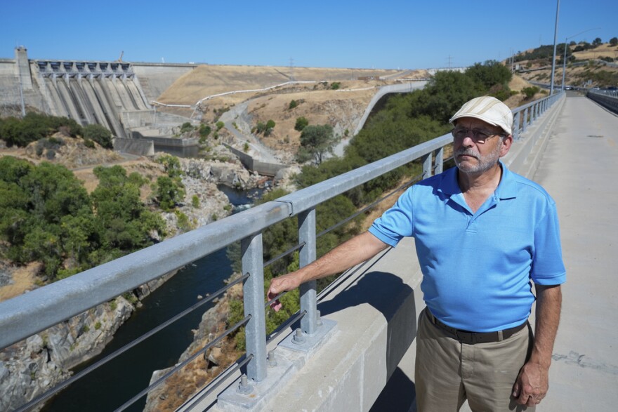 George Booth, executive director of the Floodplain Management Association, is photographed in front of Folsom Dam, Friday, Aug. 16, 2024, in Folsom, Calif.