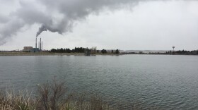 The Colstrip coal-fired power plant seen across the Castle Rock reservoir, which holds water the power plant owners contracted to transport for the city of Colstrip, taken on Apr. 15, 2021.