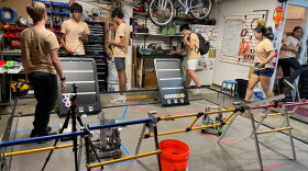 Team Infinite Turtles operates partly out of their coaches' garage where there's a playing field and equipment to manufacture parts.