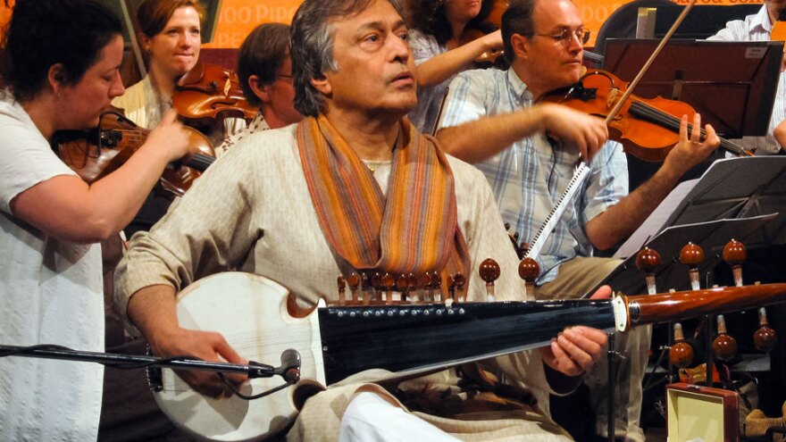 Amjad Ali Khan performs his concerto <em>Samaagam</em> with the Scottish Chamber Orchestra in Mumbai.