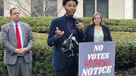 Miles Beasley, a Saint Augustine's University student and HBCU fellow at Common Cause NC, speaks with other civil rights advocates at a news conference outside the North Carolina Legislative Building in Raleigh, N.C., on Tuesday, Jan. 31, 2023. He cautioned that a temporary rule change in the state House could allow Republicans to hold veto override votes with little notice. (AP Photo/Hannah Schoenbaum)