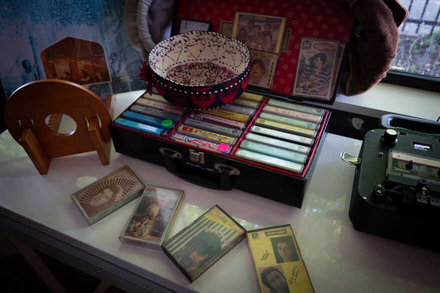 Omid's cassettes displayed in one of his ornate felt-lined cases