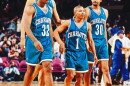 Muggsy Bogues with Charlotte Hornets teammates.